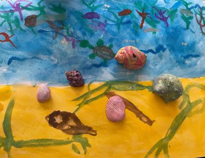 Painting of a beach with fish and shells